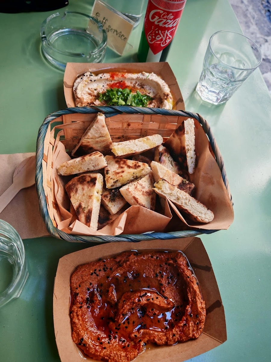 Homemade bread with hummus and muhammara at Sumac